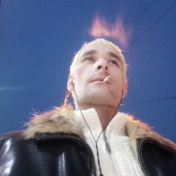 Блондин